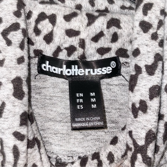 Charlotte Russe Small Womens
Sweater Dress Leopard Print Turtle
Neck NWT - Picture 4 of 4